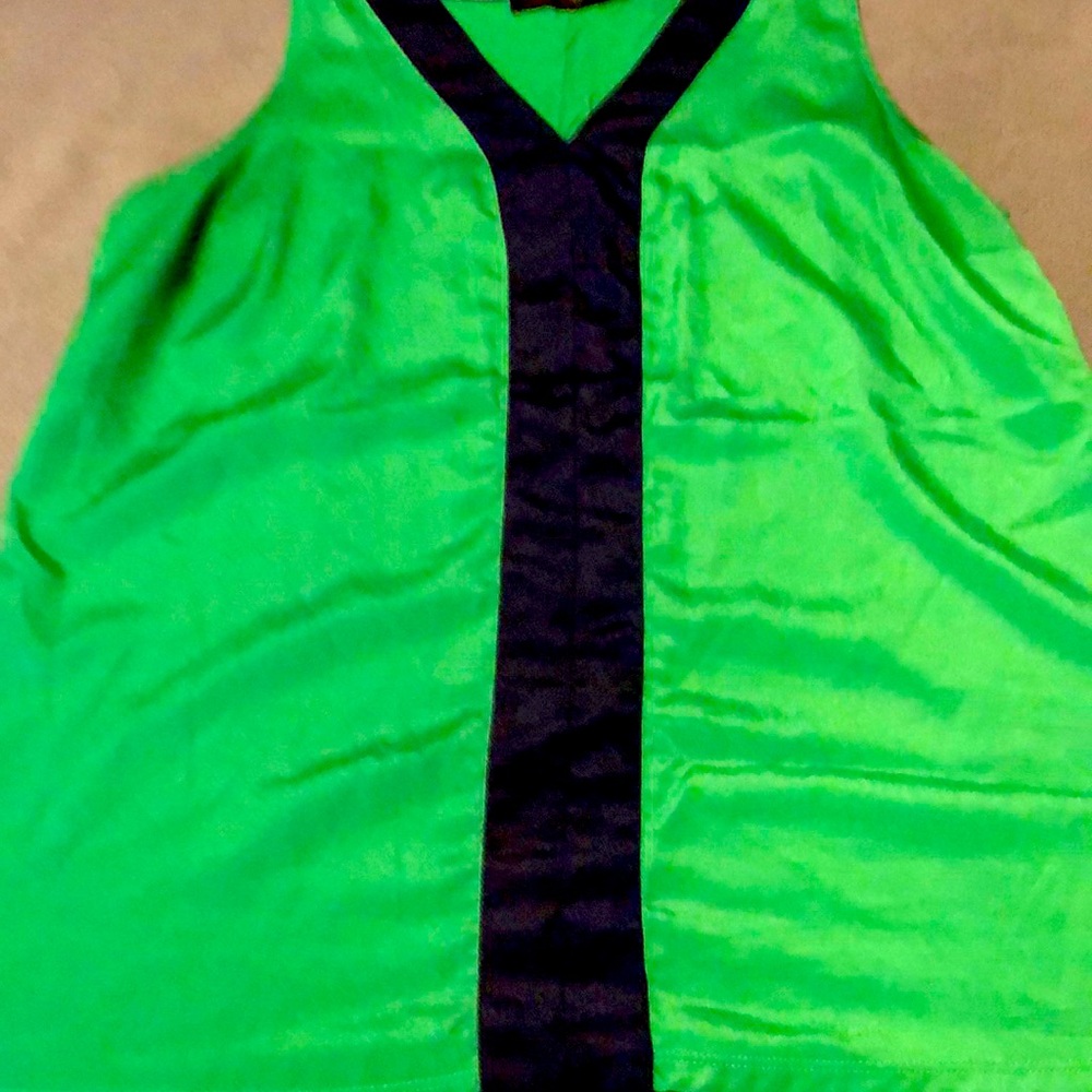 The limited top green and navy blue
